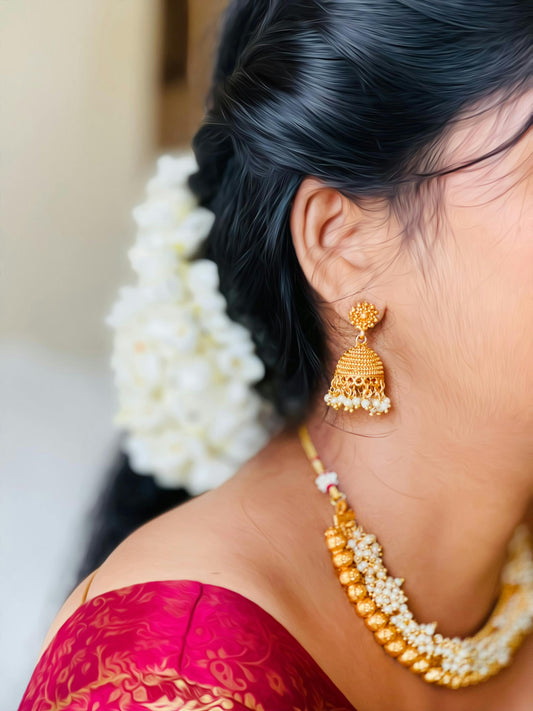 The Timeless Appeal of Gold Jhumki Earrings: A Journey Through History