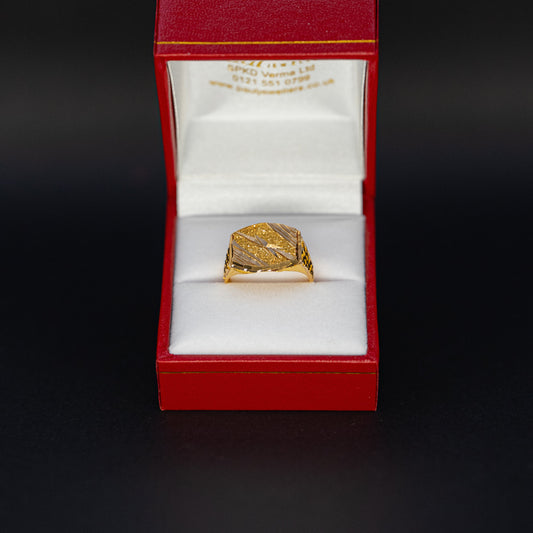 Gold ring in a red box on a black background