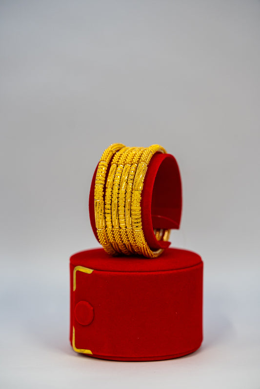 Six Gold Bangle Set