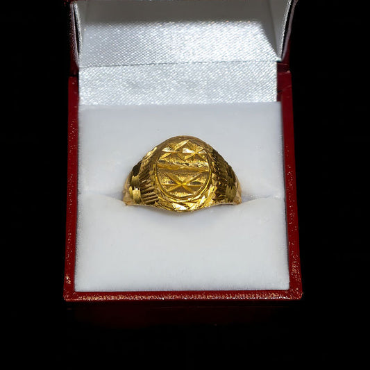 Gold ring in a red box on a black background